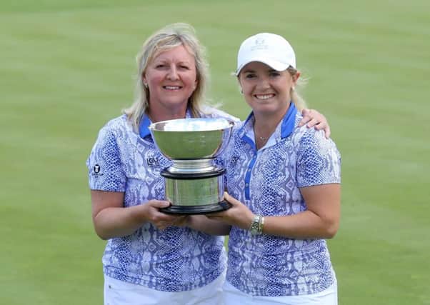Bronte Law holds the Curtis Cup with her captain Elaine Farquharson-Black. Picture: Getty