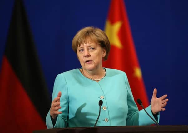 Angela Merkel delivers her speech during the China-Germany Economic and Technological Cooperation Forum in Beijing. Picture: AFP/Getty Images