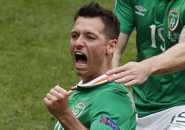 Wes Hoolahan celebrates after putting the Republic ahead after 48 minutes. Picture: Francois Mori/AP