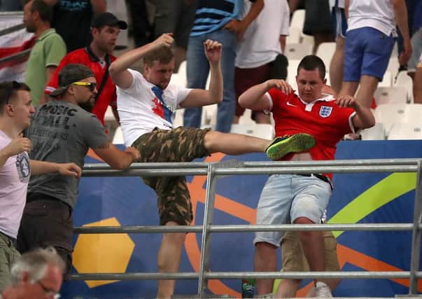 Fans clash at the England v Russia match in Marseille. Picture: Nick Potts/PA Wire.