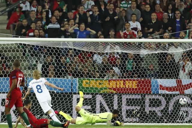 Midfielder Birkir Bjarnason pounces to equalise for Iceland