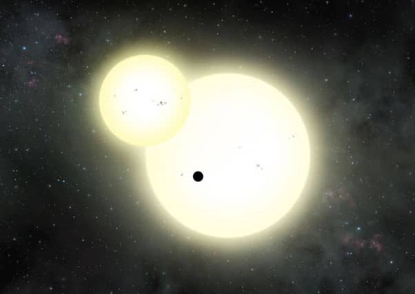 Artist's impression of a Jupiter-sized "Tatooine" planet. Picture: Lynette Cook/PA Wire