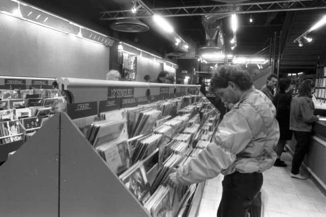 A customer browses 12" singles at the Other Record Shop, which moved from Edinburgh's High Street to Princes Street in December 1985. Picture: Bill Newton/TSPL