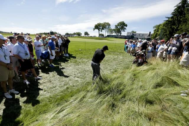 Rory McIlroy plays out of the rough on the 18th hole during a practice round for the US Open at Oakmont. Picture: Charlie Riedel/AP