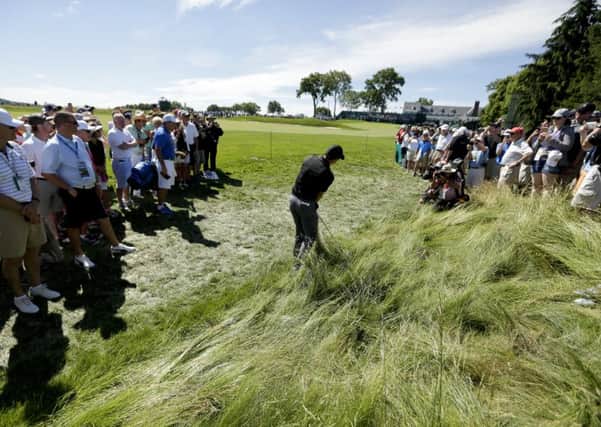 Rory McIlroy plays out of the rough on the 18th hole during a practice round for the US Open at Oakmont. Picture: Charlie Riedel/AP