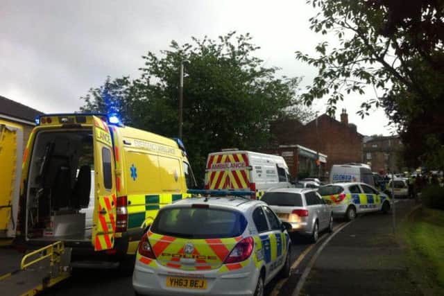 The scene outside Birstall Library. Picture; Yorkshire Post