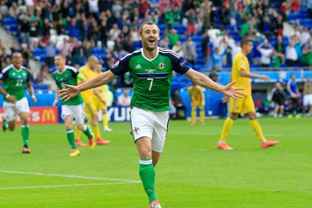 Aberdeen's Niall McGinn celebrates scoring Northern Ireland's second goal against Ukraine in Lyon. Picture: Jonathan Brady/PA Wire