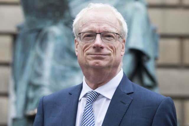 Lord Smith, pictured in front of the Hume statue on the Royal Mile during a visit to Edinburgh last week, said that Scottish complaints to the ASA total just 6 per cent of total gripes UK-wide. Picture: Ian Rutherford