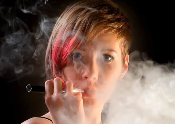 E-cigarettes are acting as a 'roadblock' to tobacco take-up among young people.