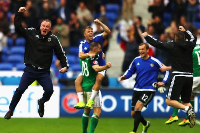 Michael O'Neill jumps for joy as Northern Ireland beat Ukraine. Picture: Julian Finney/Getty Images