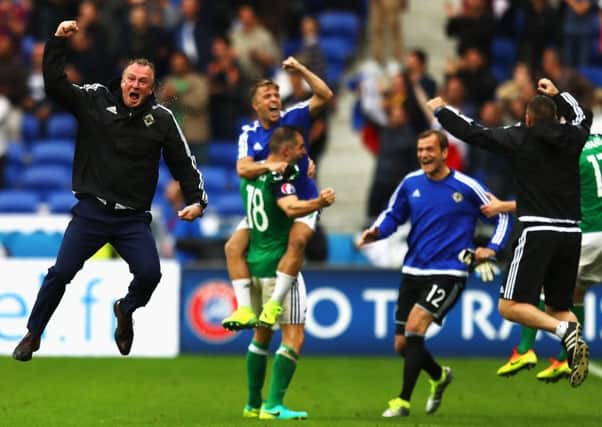 Michael O'Neill jumps for joy as Northern Ireland beat Ukraine.  Picture: Julian Finney/Getty Images