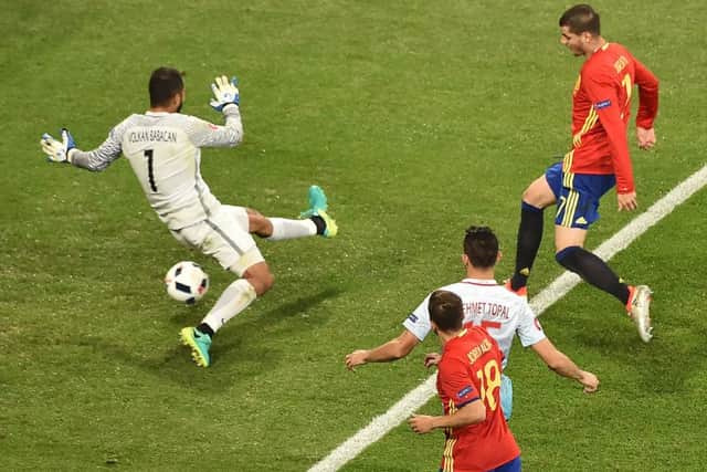 Alvaro Morata scores Spain's third after a 22-pass move. Picture: Bertrand Langlois/AFP/Getty Images