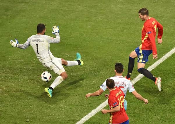 Alvaro Morata scores Spain's third after a 22-pass move. Picture: Bertrand Langlois/AFP/Getty Images
