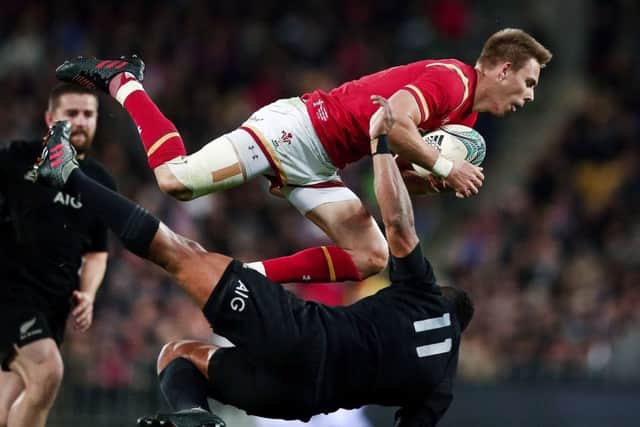 Liam Williams crashes through Waisake Naholos tackle. Picture: Getty Images