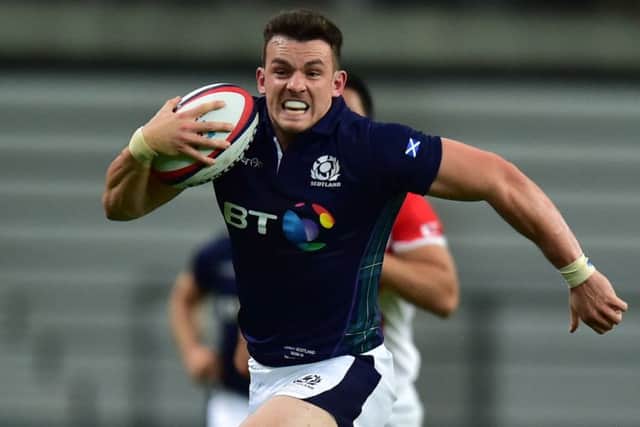 Scotland's Matt Scott sprints away during the match against Japan. Picture: Getty