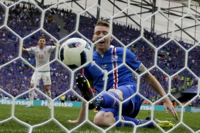 Iceland's Birkir Saevarsson scores an own goal during the Euro 2016 Group F match between Iceland and Hungary in Marseille Picture: Ariel Schalit/AP