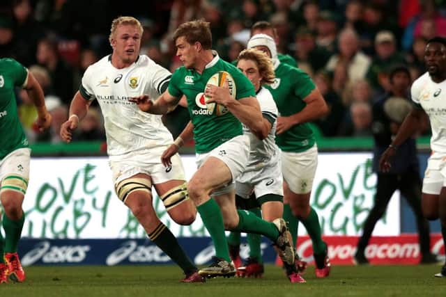 Andrew Trimble breaks through the South African defence at Ellis Park yesterday. Picture: Getty Images
