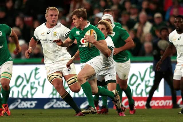 Andrew Trimble breaks through the South African defence at Ellis Park yesterday.  Picture: Getty Images
