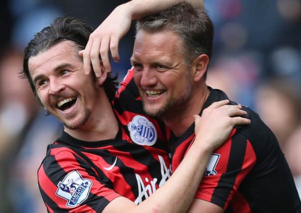 Ex-QPR team-mates Joey Barton and Clint Hill have been reunited at Rangers. Picture: Getty