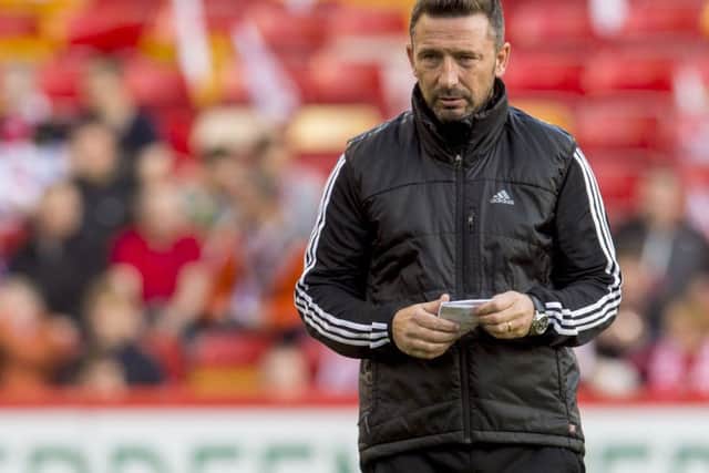 Aberdeen manager Derek McInnes saw his side eliminated by Kairat Almaty last year. Picture: SNS