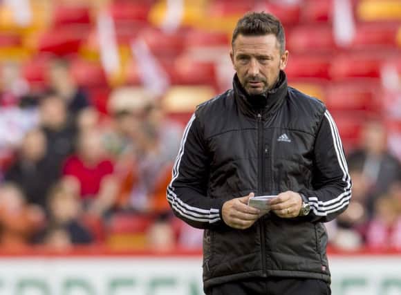 Aberdeen manager Derek McInnes saw his side eliminated by Kairat Almaty last year. Picture: SNS