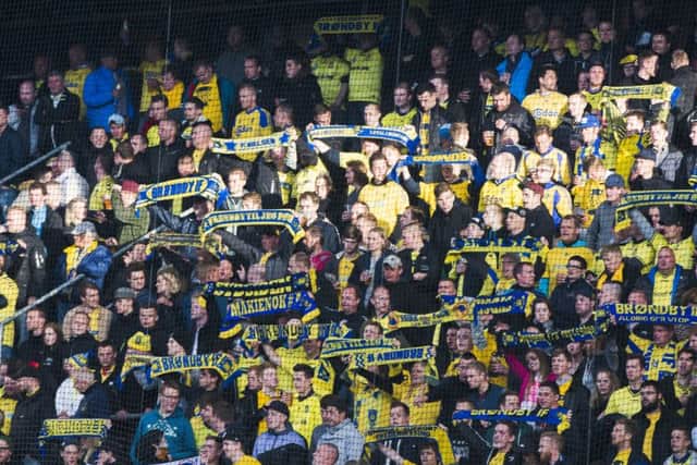 Brondby fans, bedecked in their traditional blue and yellow. Pic: Getty