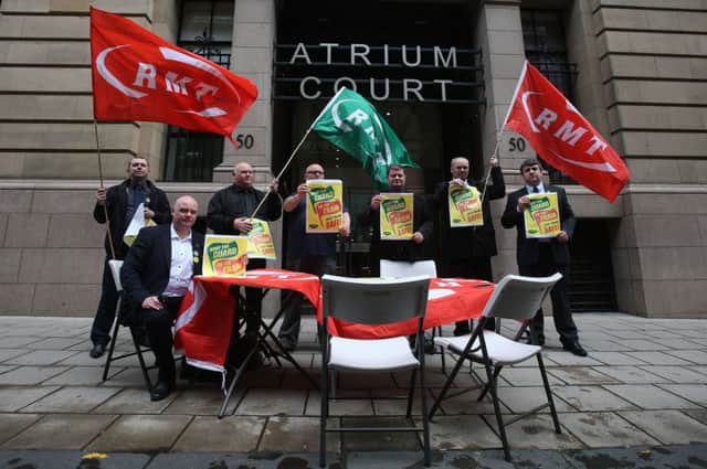 Rail, Maritime and Transport (RMT) union officials including Steve Hedley, Senior Assistant General Secretary (second left) take part in a demonstration outside ScotRail HQ in Glasgow, as members of the rail union are demanding talks in the Guards dispute. PRESS ASSOCIATION Photo. Picture date: Monday June 20, 2016. RMT claimed ScotRail was refusing to meet at the conciliation service Acas. See PA story INDUSTRY ScotRail. Photo credit should read: Andrew Milligan/PA Wire
