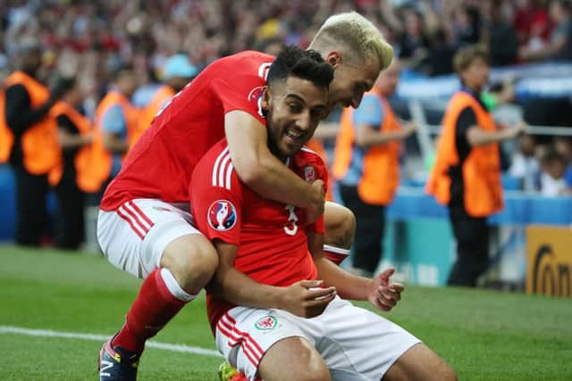 Aaron Ramsey, left, celebrates with Neil Taylor after Taylor had put Wales 2-0 ahead against Russian in Toulouse. Picture: Yegor Aleyev/ Getty Images