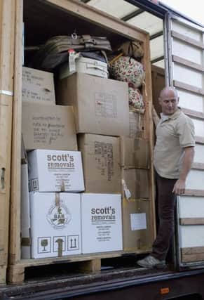 Boxes filled with precious belongings can find themselves languishing in the spare room after a move  but the minimalist, just-moved-in look never lasts for long. Picture: Getty