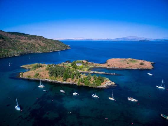 The private island is located off Crinan Harbour, which is a 100 mile trip to the west of Glasgow. Picture: SWNS/Savills