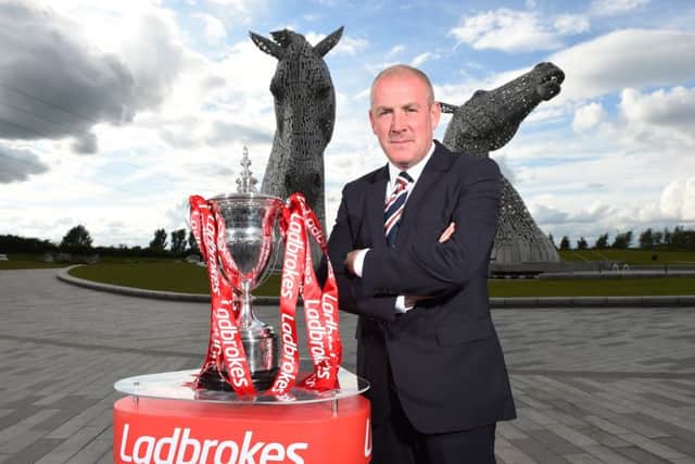 Rangers manager Mark Warburton with the Ladbrokes SPFL Championship trophy at the Kelpies. Picture: Craig Williamson/SNS