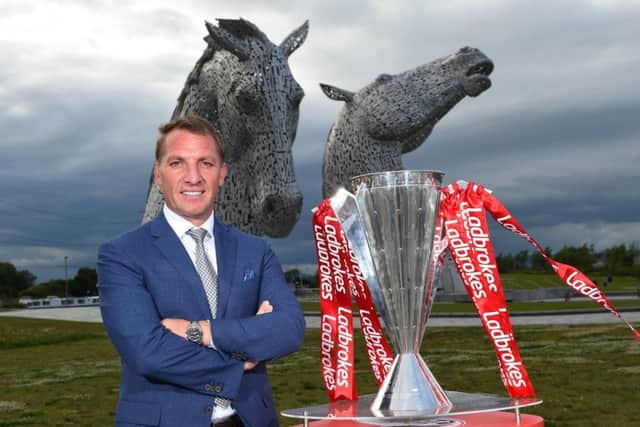 Celtic manager Brendan Rodgers with the Ladbrokes SPFL trophy at the Kelpies. Picture: Craig Williamson/SNS
