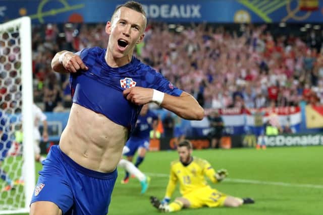Croatia's Ivan Perisic celebrates after scoring his side's late winner against Spain in Bordeaux. Picture: Hassan Ammar/AP