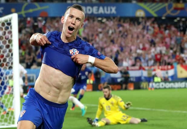 Croatia's Ivan Perisic celebrates after scoring his side's late winner against Spain in Bordeaux. Picture: Hassan Ammar/AP