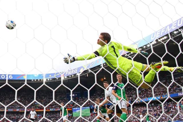 Northern Ireland goalkeeper Michael McGovern is at full stretch to deny Germany at the Parc des Princes.  Picture: Clive Mason/Getty Images