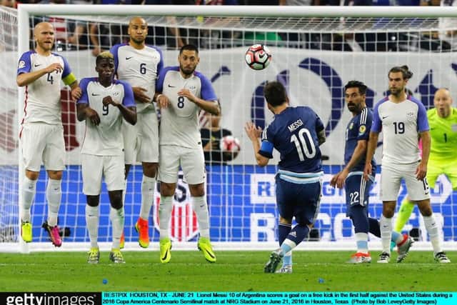 Lionel Messi scores from a free kick in the Copa America semi-final against the US to break the Argentina goalscoring record. Picture: Bob Levey/Getty Images