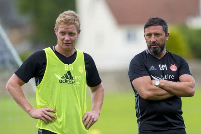 Aberdeen manager Derek McInnes at training with Barry Robson. Picture: Craig Foy/SNS