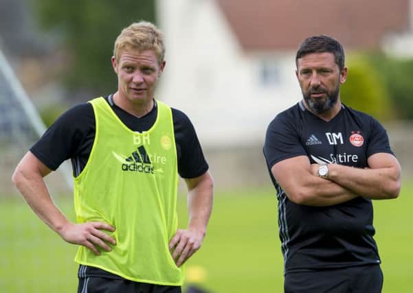 Aberdeen manager Derek McInnes at training with Barry Robson. Picture: Craig Foy/SNS