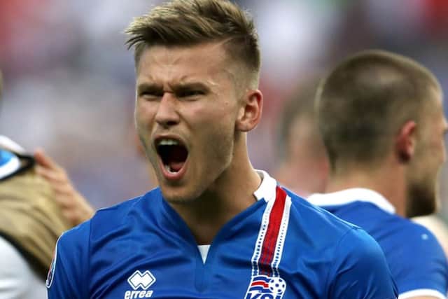 Iceland's Arnor Ingvi Traustason celebrates his late winner. Picture: Owen Humphreys/PA Wire.