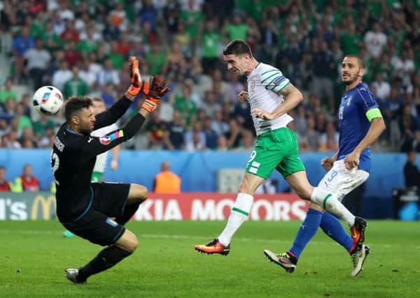 Robbie Brady connects with Wes Hoolahans perfect cross and scores the  dramatic late winner. Picture: Chris Radburn/PA Wire