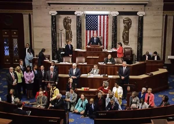 US Democrats staged a rare sit-in the House of Representatives demanding that the Republican-led body vote on gun-control legislation following the Orlando nightclub massacre. Picture: AFP/Getty Images
