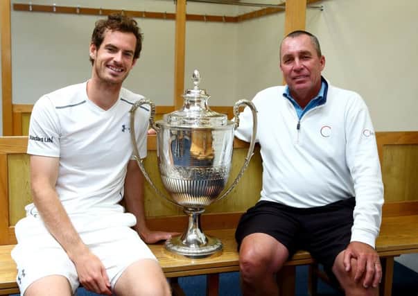 Andy Murray and his coach Ivan Lendl (R) pose with the Aegon Championships trophy after his record breaking fifth title at Queen's. Picture: Getty