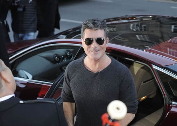 Simon Cowell has arrived in Edinburgh for the X-Factor auditions