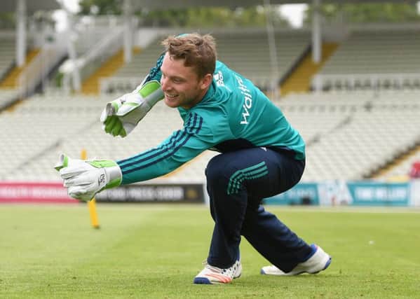 Jos Buttler takes part in a wicket-keeping drill during an England nets session at Edgbaston. Picture: Gareth Copley/Getty