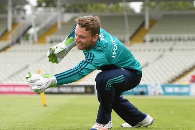 Jos Buttler takes part in a wicket-keeping drill during an England nets session at Edgbaston. Picture: Gareth Copley/Getty