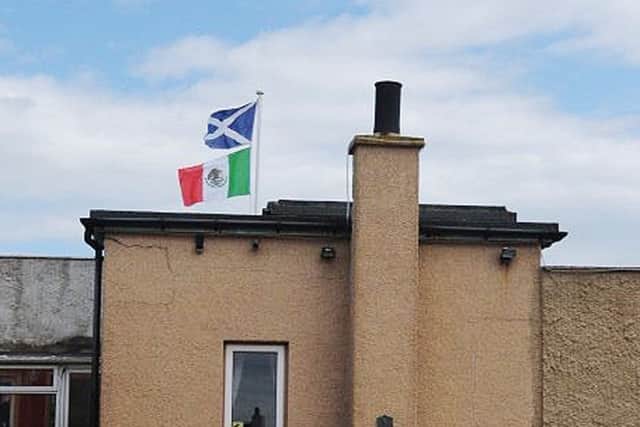 David Milne is also flying the Mexican flag flying outside his Aberdeenshire home - which overlooks Trump's golf course - to show support for people "insulted" by the US presidential hopeful. Picture: PA
