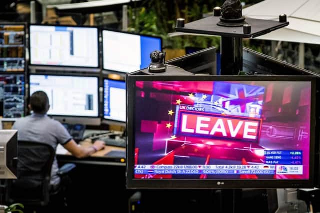The Brexit vote is announced at the Euronext Stock Exchange in Amsterdam on Friday. Photograph: AFP/Getty Images