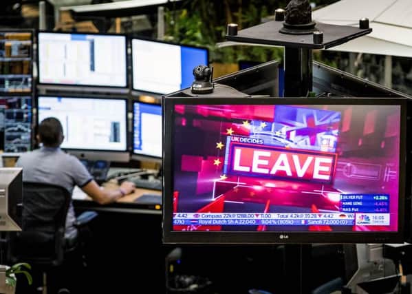 The Brexit vote is announced at the Euronext Stock Exchange in Amsterdam on Friday. Photograph: AFP/Getty Images