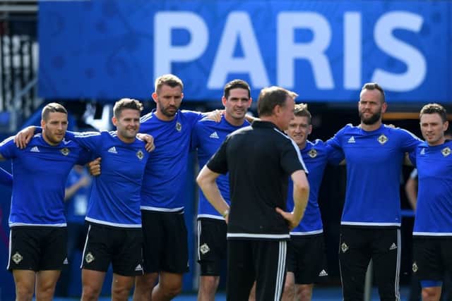 Northern Ireland manager Michael O'Neill, centre, addresses his players ahead of their Euro 2016 clash with Wales at Parc des Princes. Picture: Stu Forster/Getty Images