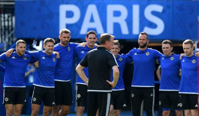 Northern Ireland manager Michael O'Neill, centre, addresses his players ahead of their Euro 2016 clash with Wales at Parc des Princes. Picture: Stu Forster/Getty Images
